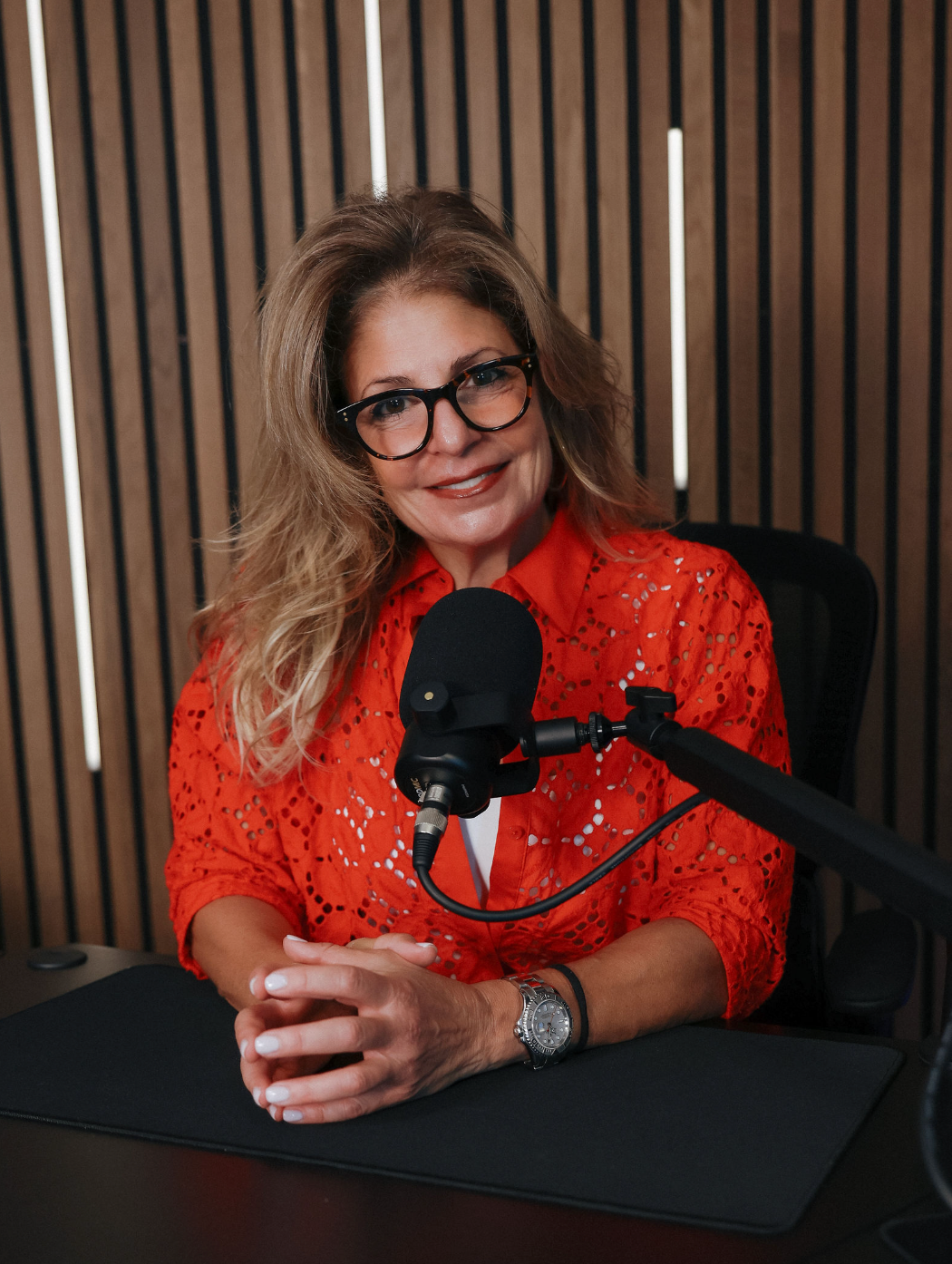 Tracy Byrnes recording the podcast